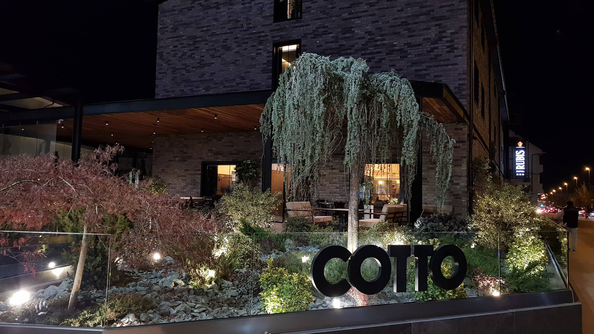 Exterior of COTTO restaurant at night